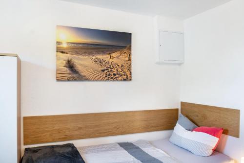 Nordsee Ferienwohnung Wattwurm - Tap to explore photos