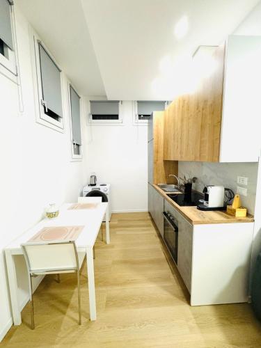 Kitchen, Appartamento accogliente per soggiorni brevi, Ozzano dell'Emilia in Ozzano dell' Emilia