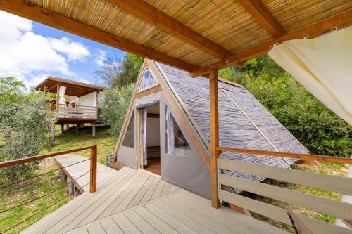 Зовнішній вигляд готелю, Glamping Le Ginestre in Монтеверді Маріттімо