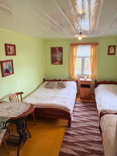 Biebrza noclegi Dom pod dobrą ręką (Biebrza noclegi Dom pod dobra reka) in Gugny