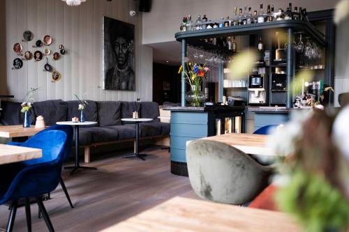 Bar/lounge, Logementen Dokkum in Dokkum binnen de Bolwerken