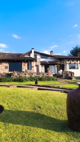 ทัศนียภาพภายนอกโรงแรม, Cabañas "Rancho La Mesa" (Cabanas "Rancho La Mesa") in ปัทซ์คูโร่