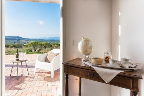 Balcony/terrace, Alghero Villa Carrabufas villa con piscina vista mare per 10 persone in Caragol