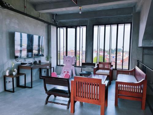 Shared lounge/TV area, Ketuk Pintu by Turu Kene in Kota Baru