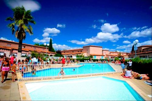 Maison climatisée 6 pers avec piscine surveillée, Plage et port à 5 min à pied, Terrasse, WiFi