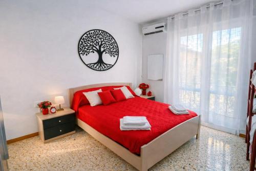 APPARTAMENTO ROSSO - OVER THE RAINBOW APARTMENTS LIDO di JESOLO A 200m dalla Spiaggia Posto Auto Aria Condizionata e Terrazza