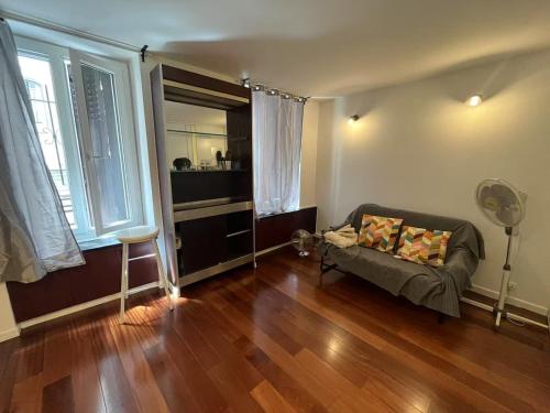 Cozy sunny entire apartment in the 16th arrondissement of Paris with a panoramic view of the Eiffel Tower just 3 minutes from the door Includes kitchen, bathroom, and living room