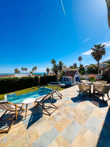 Sea view beachfront villa with pool