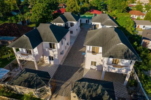 Зовнішній вигляд готелю, Tanga New Apartment in Taнга