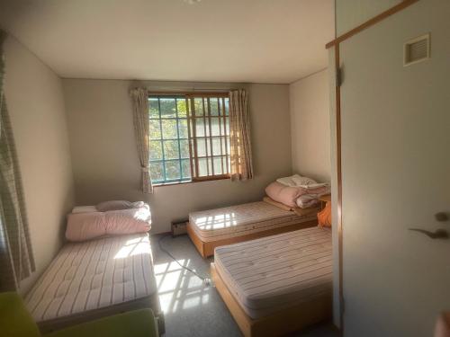 Lily of the Valley Forest Co-living & Music Lounge Self-Service in 朝日