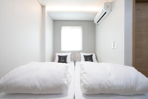 K-Guesthouse Premium Nampo 1 - Tap to explore photos