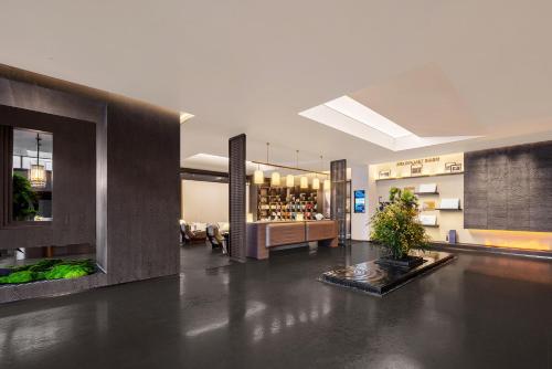 Лобби, Shanghai Wujiaochang Zhongyuan City Plaza Atour Hotel in Янпу Уцзяочан