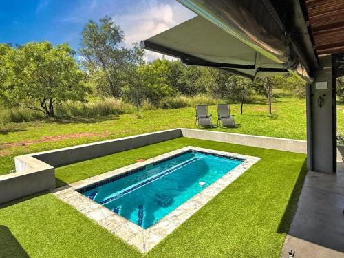 Peldbaseins, Elements Private Golf Reserve - Home 111 in Waterberg Estate