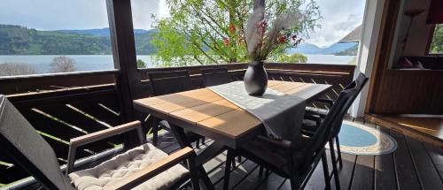Erkély/terasz, Ferienwohnungen Fischerhaus - direkt am See in Millstatt