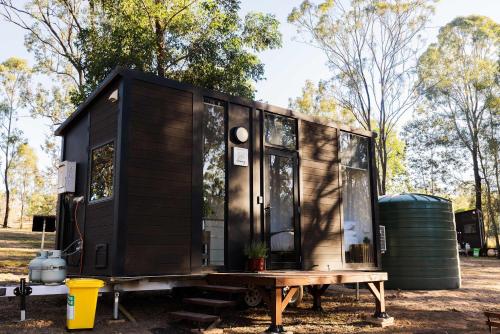 . Kenny and Clancy's Camp by Tiny Away