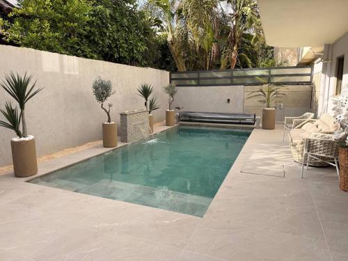Swimming pool, Luxury Family Villa with Private Pool & Jacuzzi in Raanana