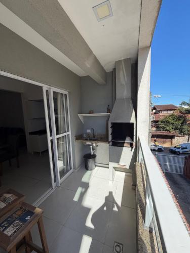 บริการและสิ่งอำนวยความสะดวก, Apartamento em Ubatuba 2 Quartos com Ar e Churrasqueira 700m da Praia Itagua Garagem in ปรายา โด อิตากวา