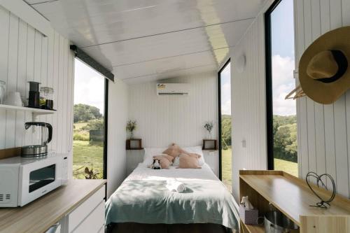 Rainforest Sunsets by Tiny Away in Kuranda