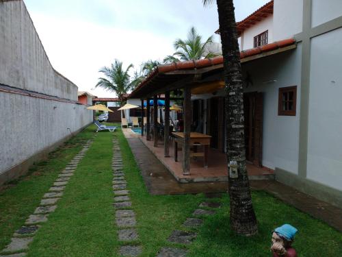 حديقة, Residencia Toca do Cacao Suites in ماغونهوس بيتش