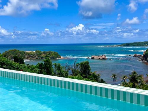 Sea Cliff Eco-Cottages & Gin Distillery – khách sạn tại Calibishie
