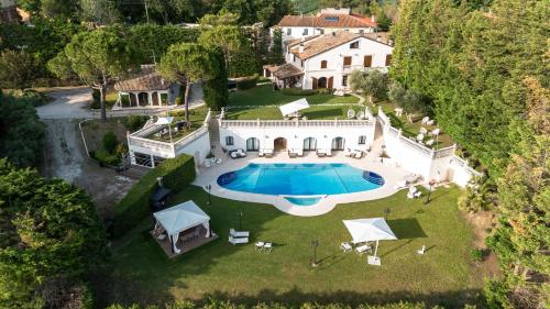 A szálláshely kívülről, 92 négyzetméteres, 1 hálószobás Ház 1 fürdőszobával Montecchio területén (Living la Dolce Vita with Pool) in Vallefoglia