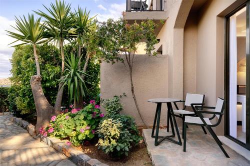 Domes Aulus Elounda, Adults only, Curio Collection by Hilton Room Type - Tropical Nest Queen Room