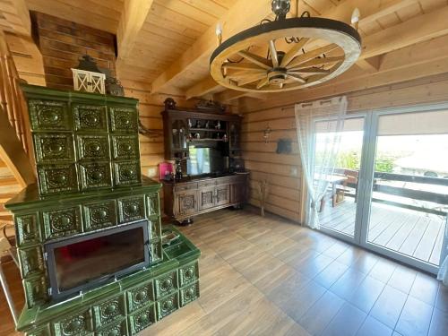 Holiday home with a garden, right by the lake in Mocki