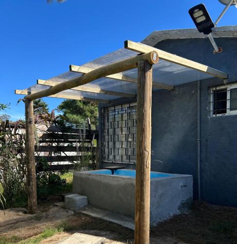 Escapada romántica con piscina y estufa a leña en Cuchilla Alta