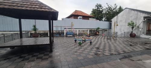 Garden, CaiPods Backpacker Hostel by G10 Guest House Bandung in Pasteur