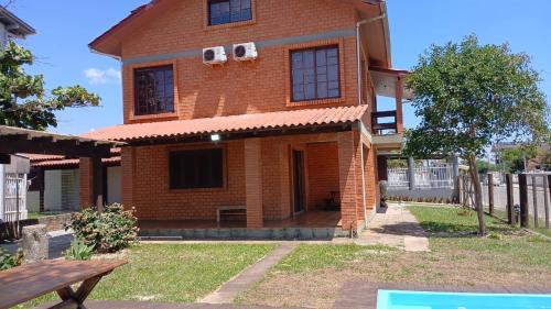 . Casa Ampla com Piscina ate 15 pessoas rua central de Itapeva Torres