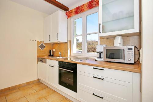 virtuve, Ferienhaus Nanni in Wittenbeck