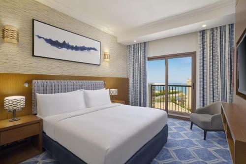 DoubleTree by Hilton Resort  & Spa Marjan Island Room Type - King Room with Balcony and Island View