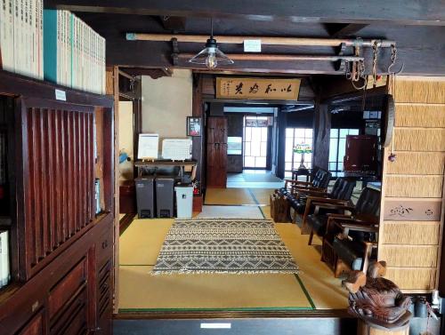 Shared lounge/TV area, 以久波別邸虎屋 in Ukiha
