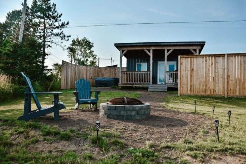 . Waterfront Seacan Retreat with Hot Tub