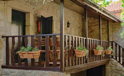 Casa de Assade in กรีมันเซโลส