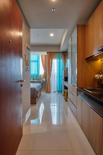 Entrance, Roseville Soho & Suite Apt - BSD New Apartment near ICE BSD - Full furnished in Serpong