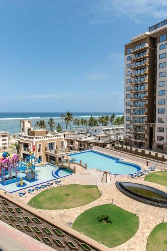 Sandy Shore Beach Apartments - Karibu Quarters – khách sạn tại Kanamai