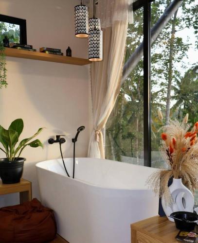 15 mins from barge with tub + wifi (glass cabin) – khách sạn tại Quận Babak - Đảo Samal