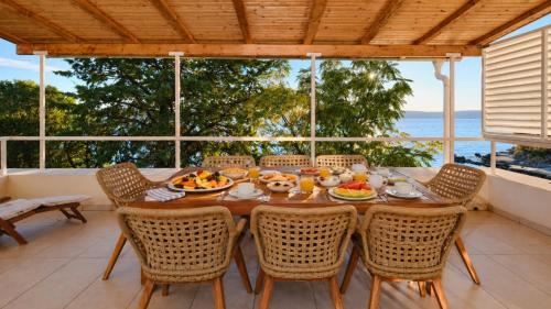 Villa Hemingway beachfront by Villas Guide in Baške Oštarije