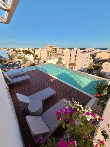 Nuevo estudio con rooftop y alberca cerca de la 5a Av y playa