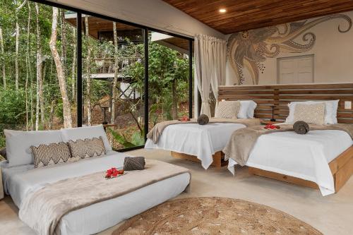 Pandanus Lodge & Retreats Bungalow Orchidee in Muelle San Carlos