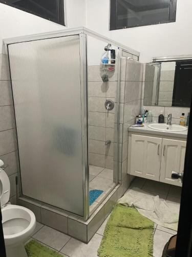 Bathroom, 2-Bedroom Apartment - Perfect for Carnival Stay! in Woodbrook