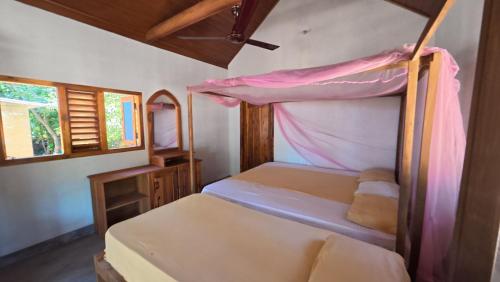 Happy Hippy Beach Cabanas Peanut Farm in Panama