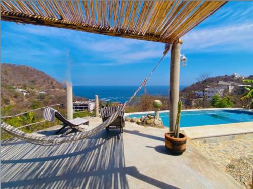 Peldbaseins, Macondo Guest House Beach in Playa Estacahuite