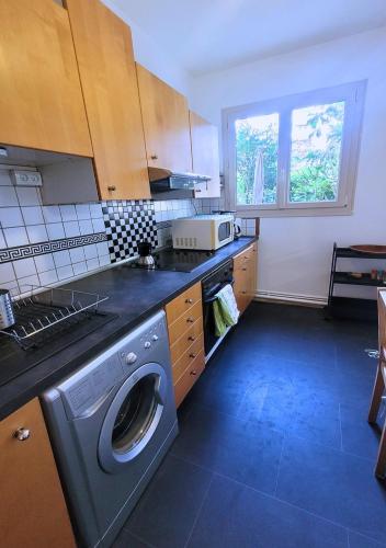 Appartement avec jardin privé - Proche transports - Accès Paris (Appartement avec jardin prive - Proche transports - Acces Paris) in Коломб