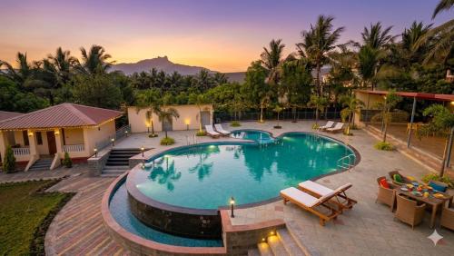 Swimming pool, The Vachraj Resort By Spring Tree Hotels in Shedung