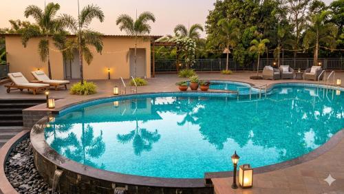 Swimming pool, The Vachraj Resort By Spring Tree Hotels in Shedung