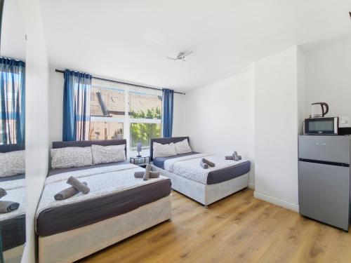 4 pers studio style room Near South Wimledon station R3 chambre d'hôte Morden
