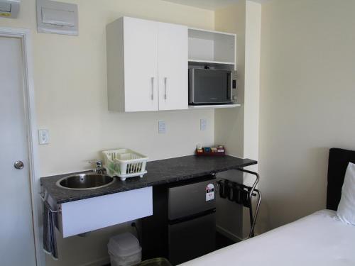 virtuve, Twin Coast Adventures Motel & Cycle Hire in Kaikohe