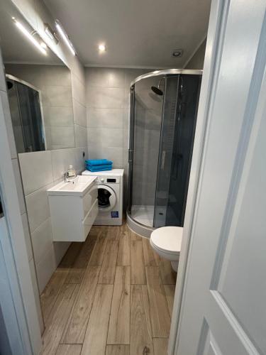 Leśny Apartament V (Lesny Apartament V) in Щитно
